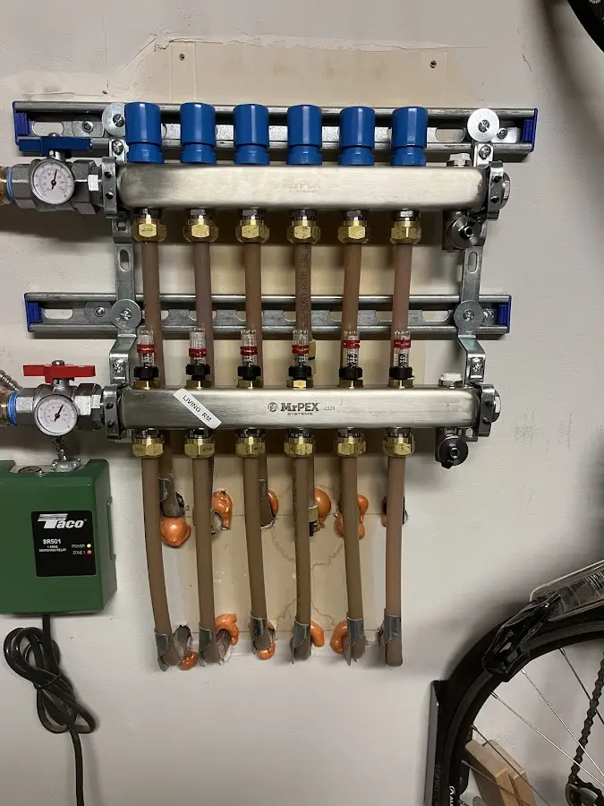 Plumber performing Water Heater Repair at a residential property in Wonder Lake